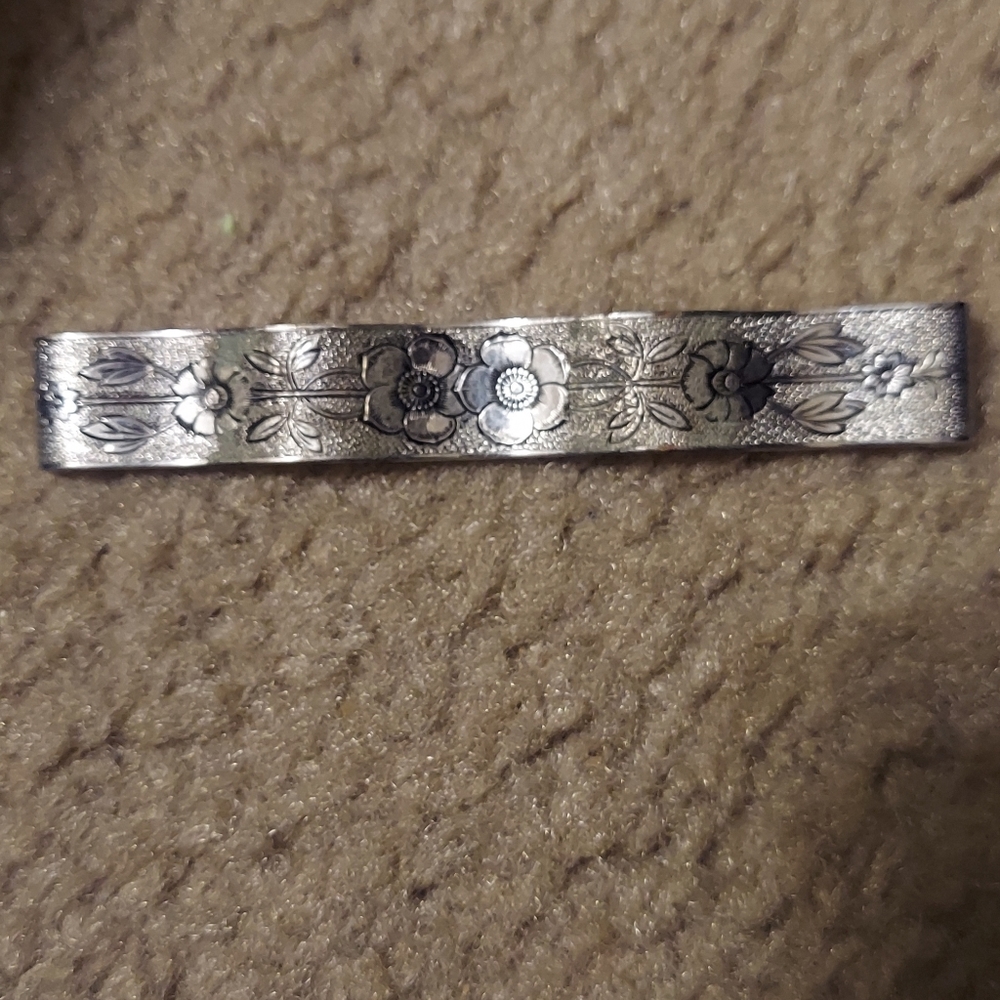 Vintage pin floral design works